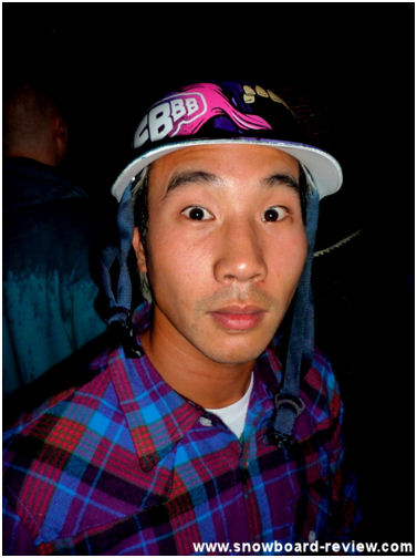 Mikee C Party Liason enjoys the free Tiger beer